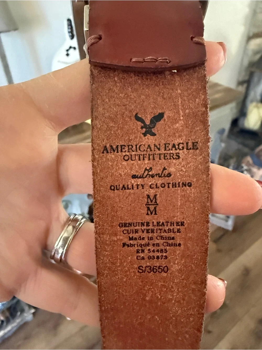 2010 American Eagle Leather Belt with Floral Buckle size Medium